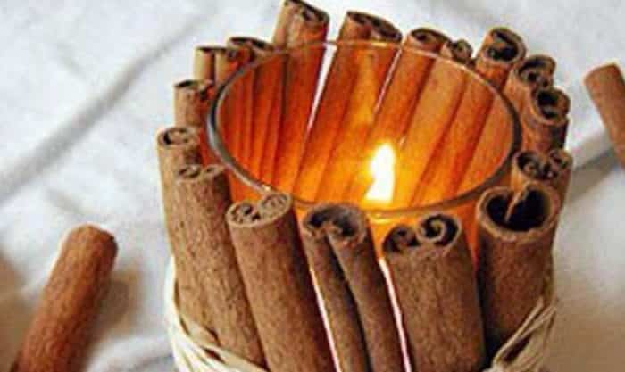 Porta vela decorada com canela