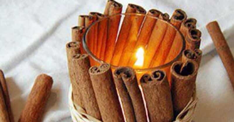 Porta vela decorada com canela